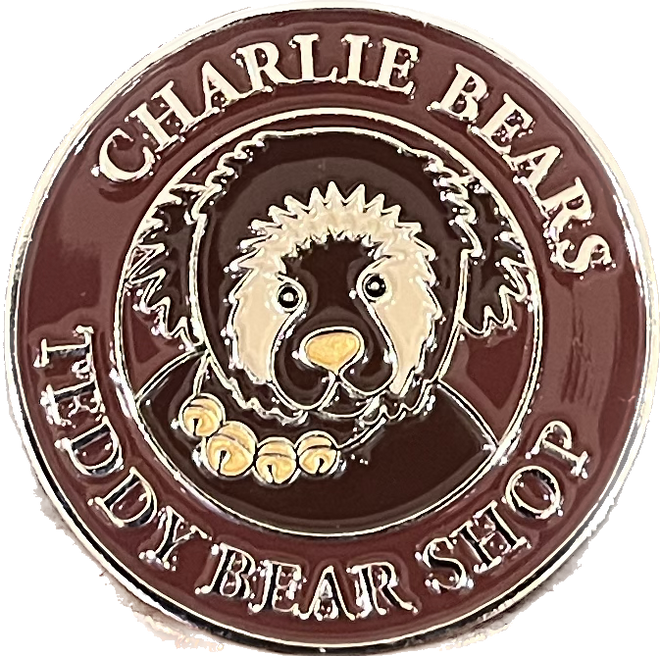 Charlie Bears paw store pin badge